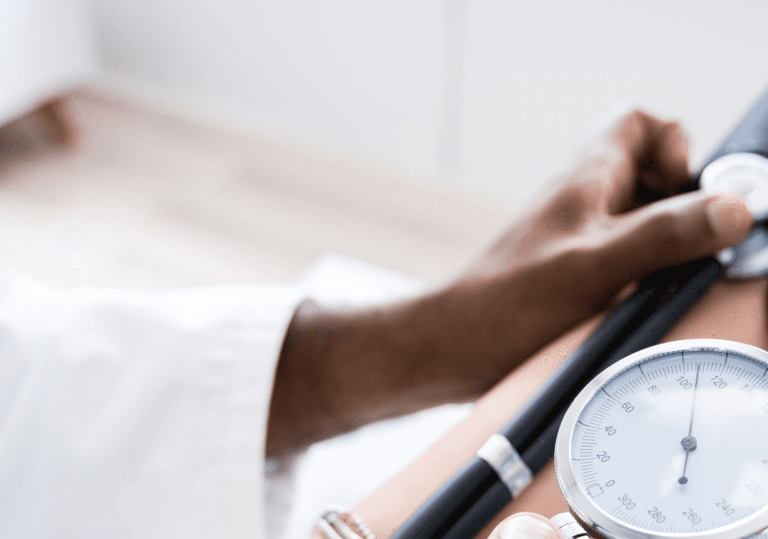 Healthcare provider performing a blood pressure check as part of Optima Medical’s comprehensive preventative medicine program in Arizona.