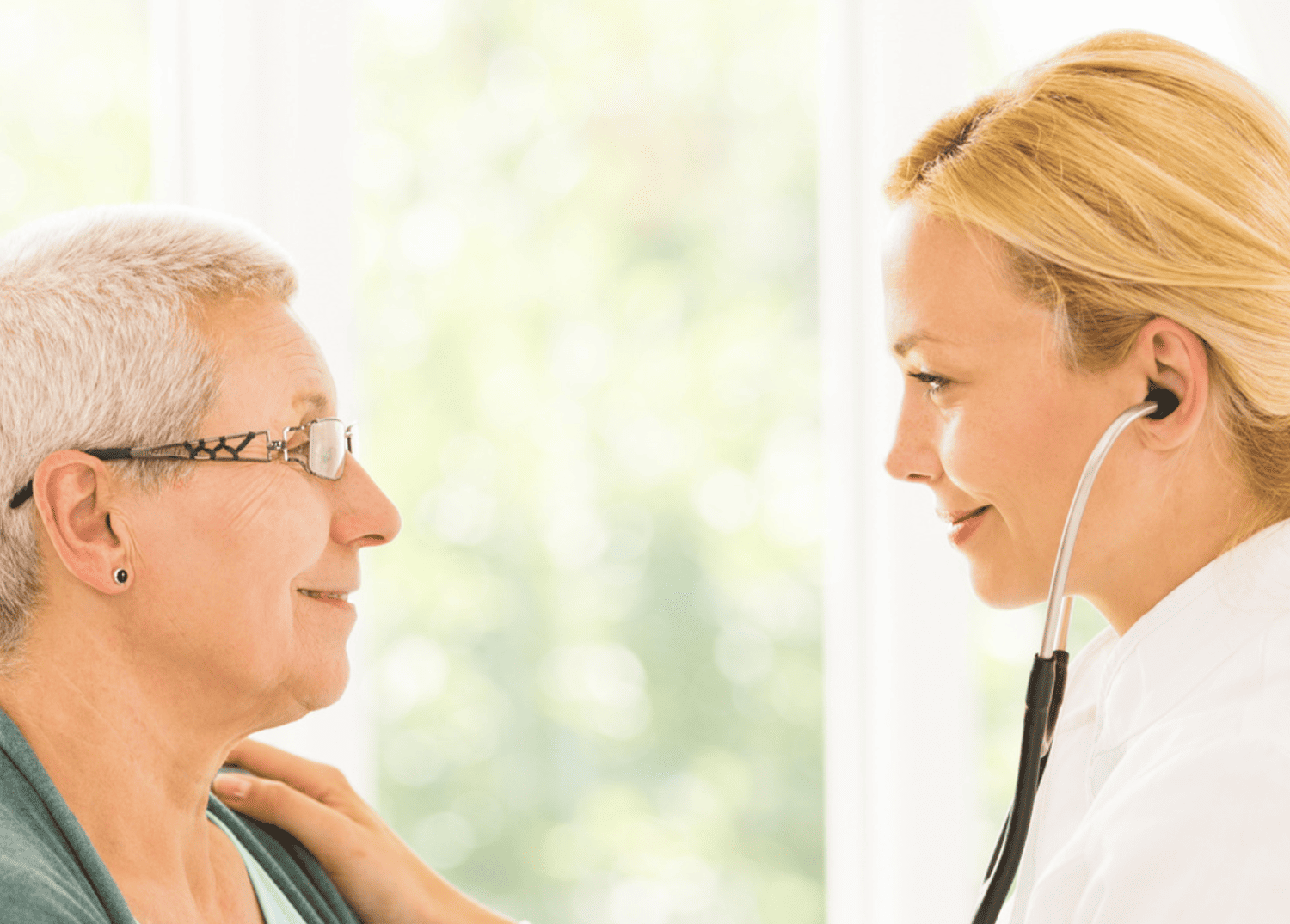 Doctor performing a heart risk assessment with a senior patient at Optima Medical clinic in Arizona.